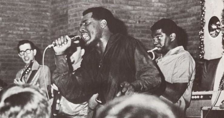 Otis Redding performing live with his band