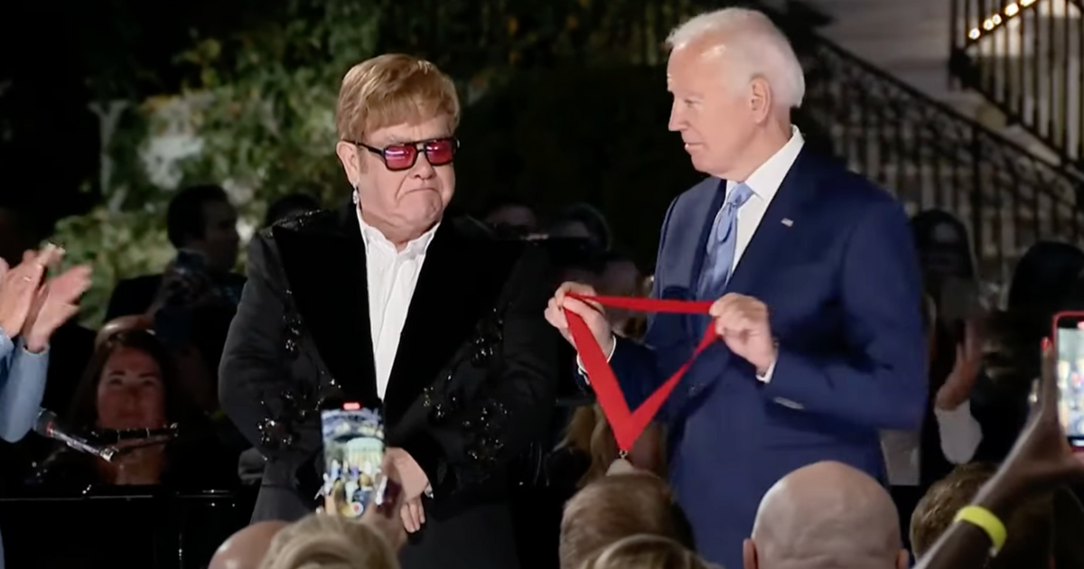 President Biden Surprises Elton John With National Humanities Medal At